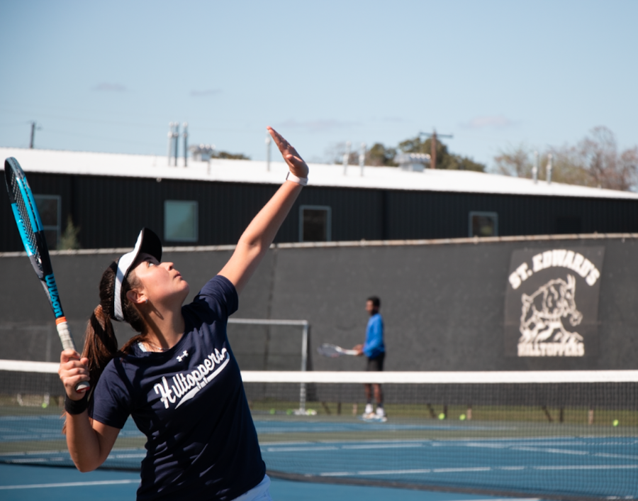 Freshman Camila Baeza prepares a serve during a weekly practice. As a newcomer, Baeza is already making an impact for the team as her win against St. Marys has contributed to the Hilltoppers 6-0 start.