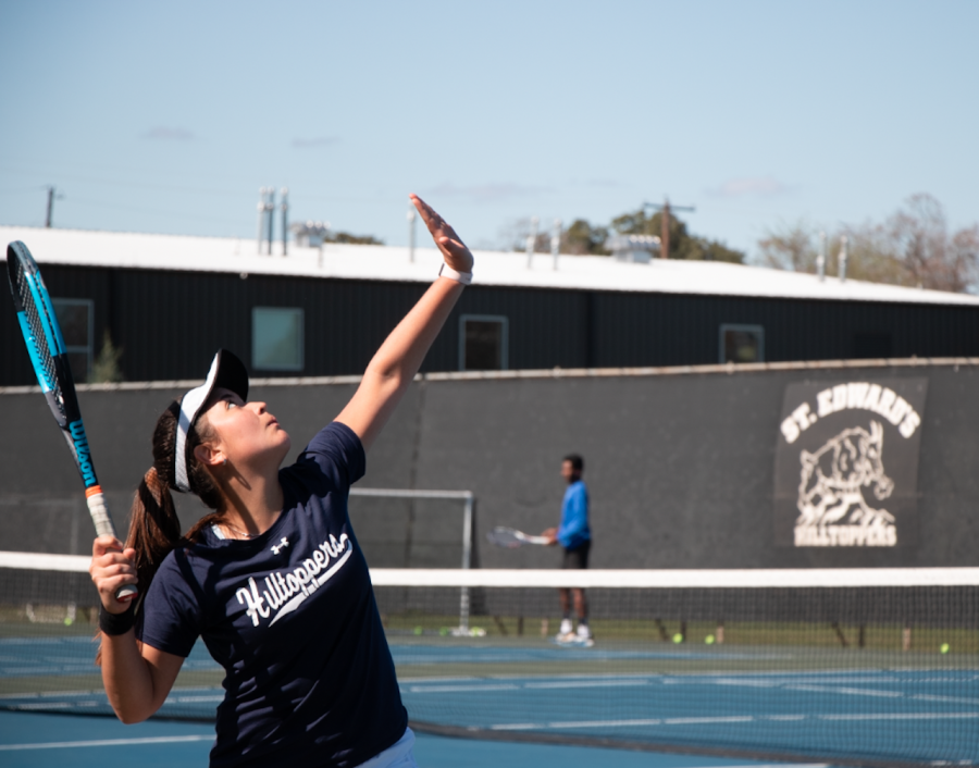 Freshman Camila Baeza prepares a serve during a weekly practice. As a newcomer, Baeza is already making an impact for the team as her win against St. Mary's has contributed to the Hilltoppers' 6-0 start.