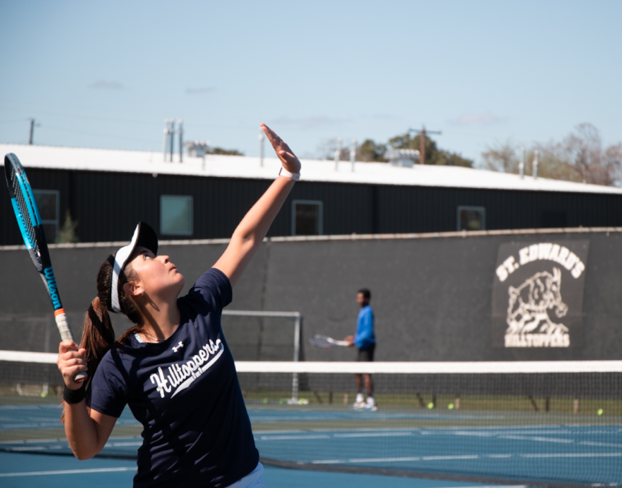 Freshman+Camila+Baeza+prepares+a+serve+during+a+weekly+practice.+As+a+newcomer%2C+Baeza+is+already+making+an+impact+for+the+team+as+her+win+against+St.+Marys+has+contributed+to+the+Hilltoppers+6-0+start.