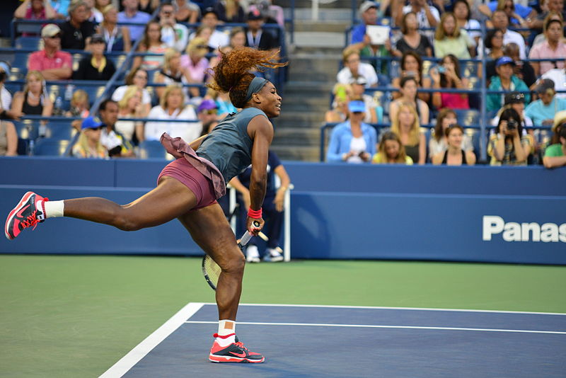 Serena Williams serves during a 2013 US Open match at Flushing Meadows, New York. She is the most accomplished tennis player of the open era — male or female ­— with 23 Grand Slam titles to her name.