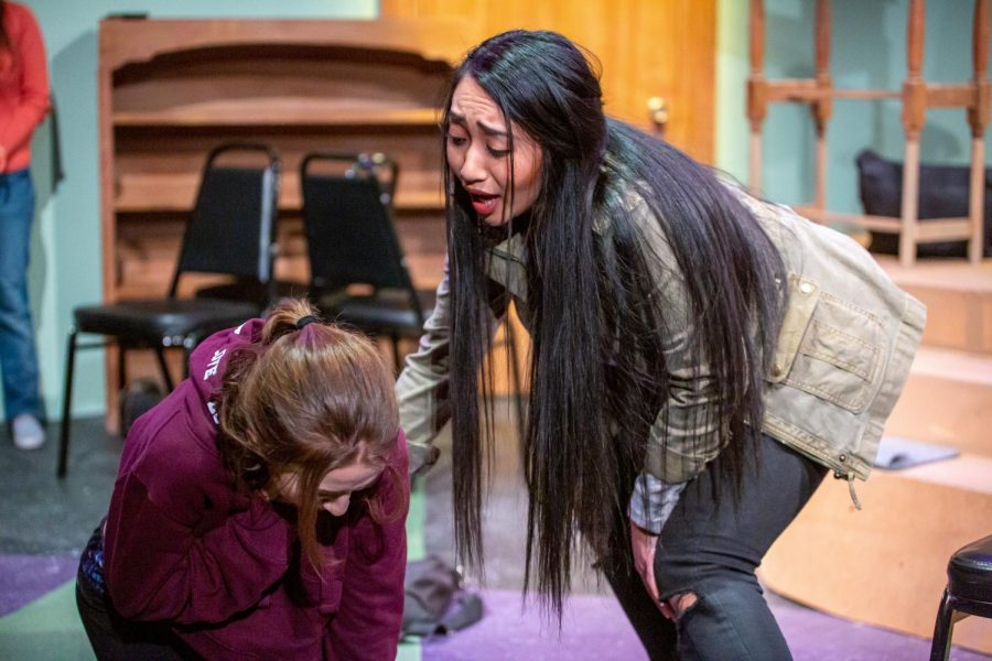 Payton Russell (left) and Bianca Ibarra perform a scene in ‘good friday.’ The production featured an all-female cast and crew.
