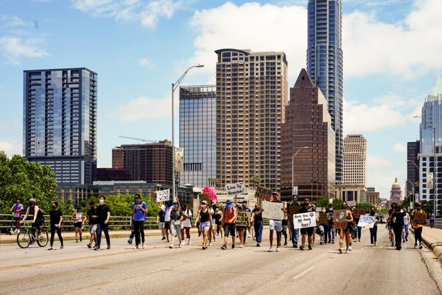 Protestors march down South Congress Avenue during a Black Lives Matter protest. These worldwide protests began in response to the murder of George Floyd in Minneapolis.