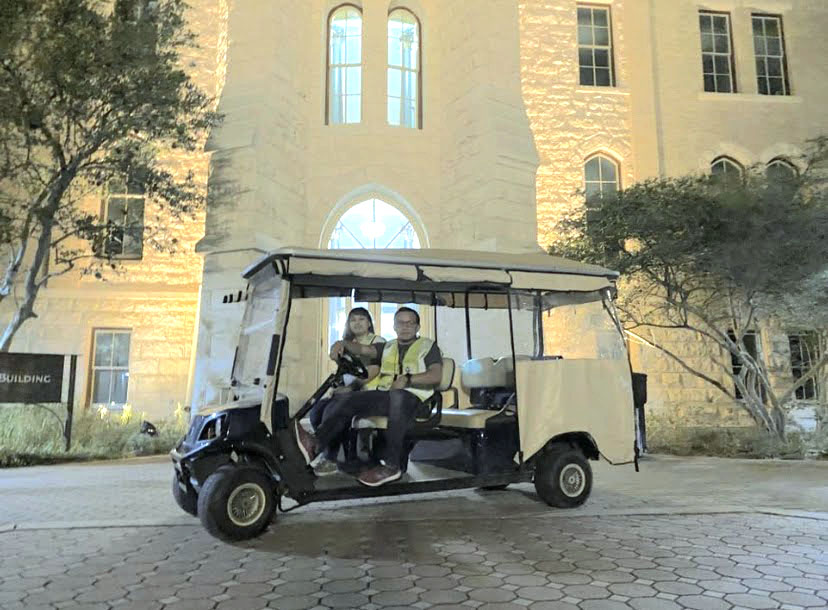 Denise Mares and Samuel Barrios are two drivers for SafeWalkSEU. Due to COVID-19, volunteers are required to wear masks and riders face away from them in the golf carts.