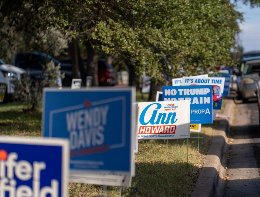 Democratic candidate yard signs line streets in south Austin. Depending on the election results, Texas may turn to a blue state or remain red.