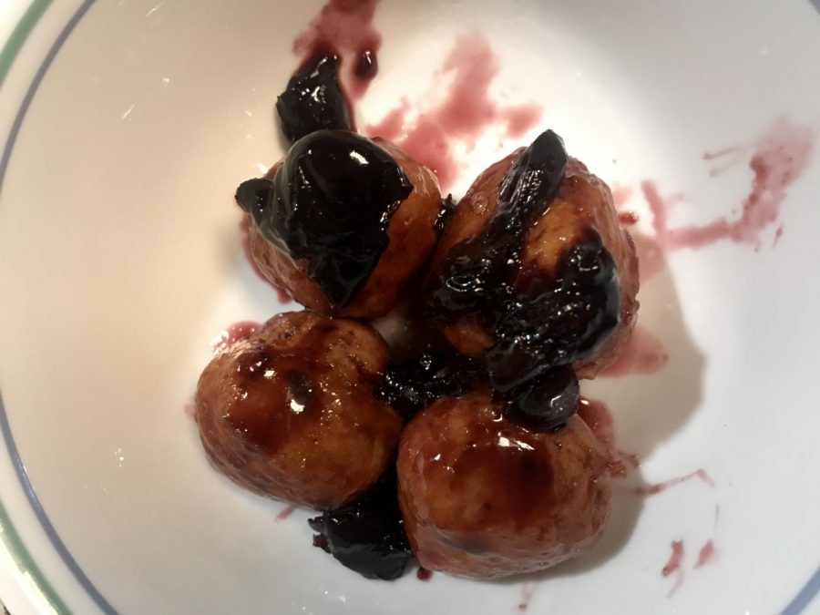 Donut holes are round, bite-sized donuts. Adding a cherry glaze can make them a sweet, festive way to celebrate Valentine's Day.
