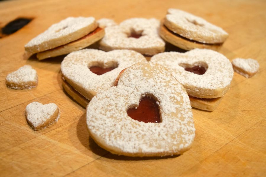 Linzer cookies originated from Austria. They are sandwich cookies filled with jam or fruit preserves.