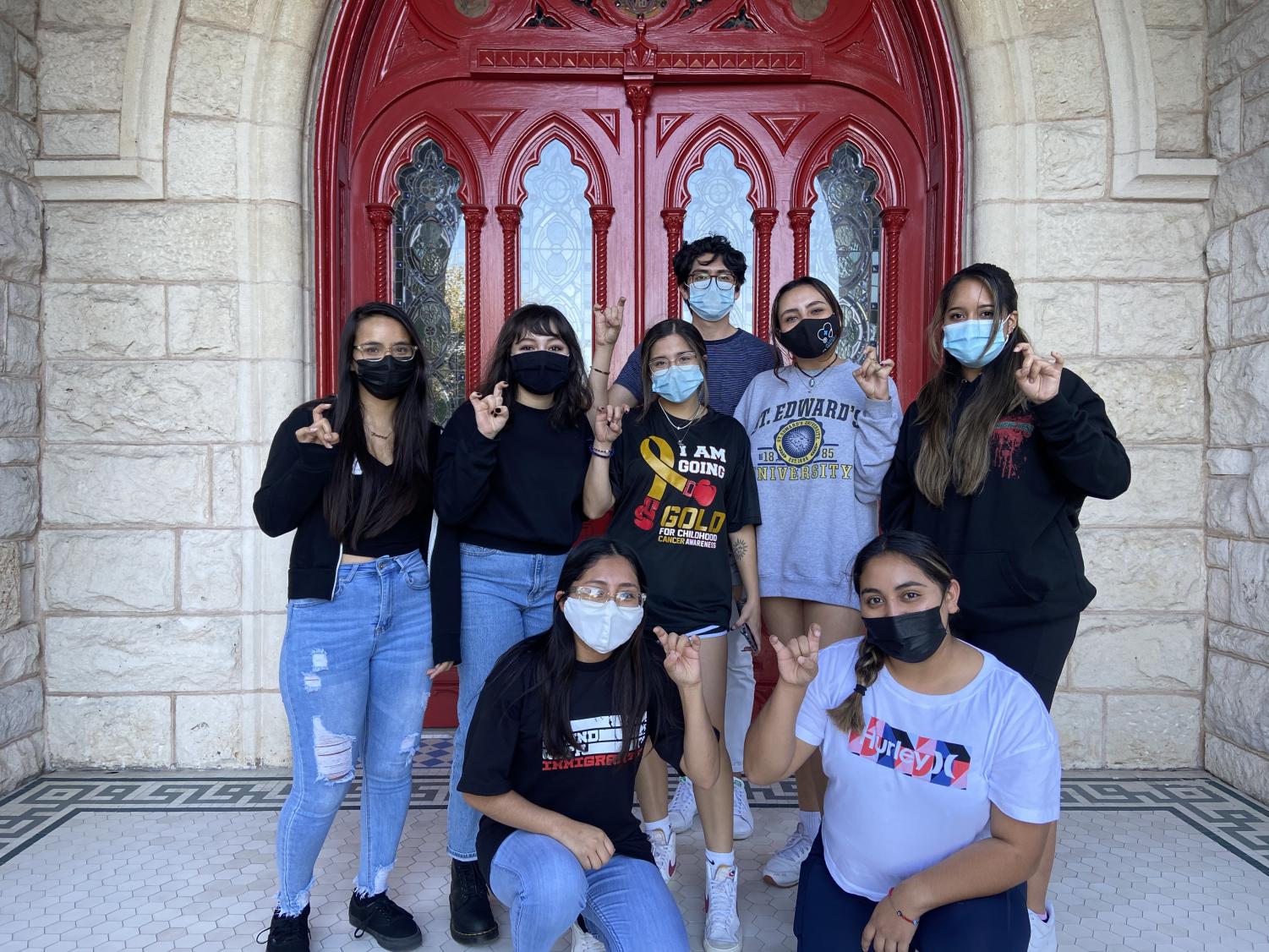 Members of St. Edwards Latinx Student Leaders Organization (LSLO) pose for a group photo in front of Main Building. Their sugar skull event also took place in front of Main Building.