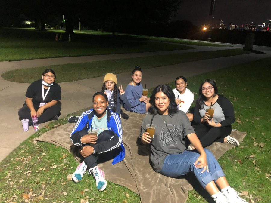 Students from PRSSA enjoy boba tea together before they begin painting.