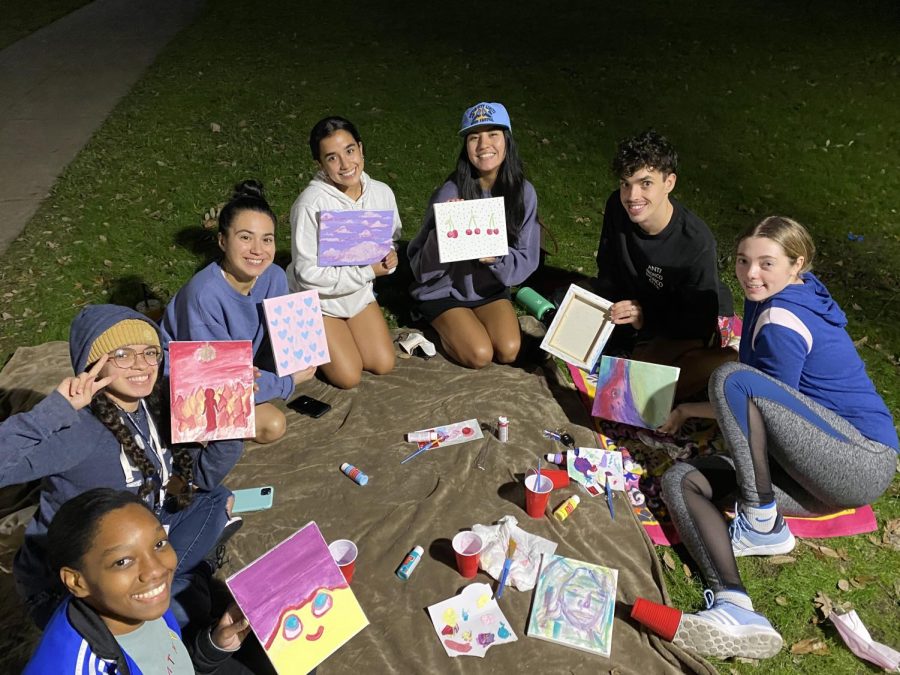 Students showcase their paintings at the St. Edwards Public Relations Student Society of Americas event. The event invited students to socialize, drink boba and paint.