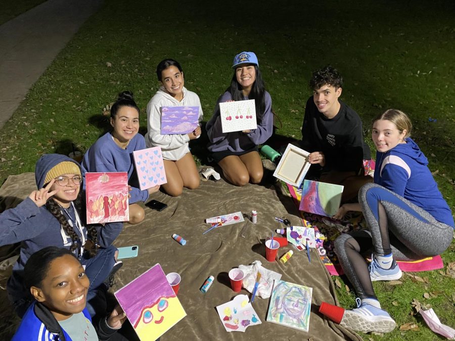 Students showcase their paintings at the St. Edward's Public Relations Student Society of America's event. The event invited students to socialize, drink boba and paint.