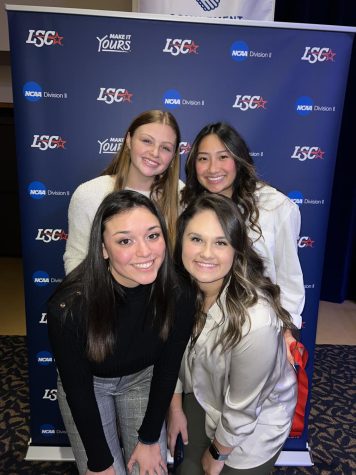 St. Edwards womens volleyball seniors celebrate their second place finish in the Lone Star Conference Tournament.