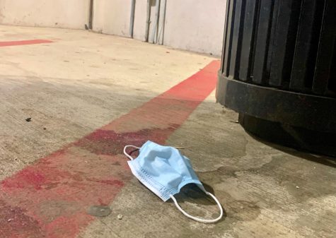 One of the masks littered throughout the parking garage on campus. 