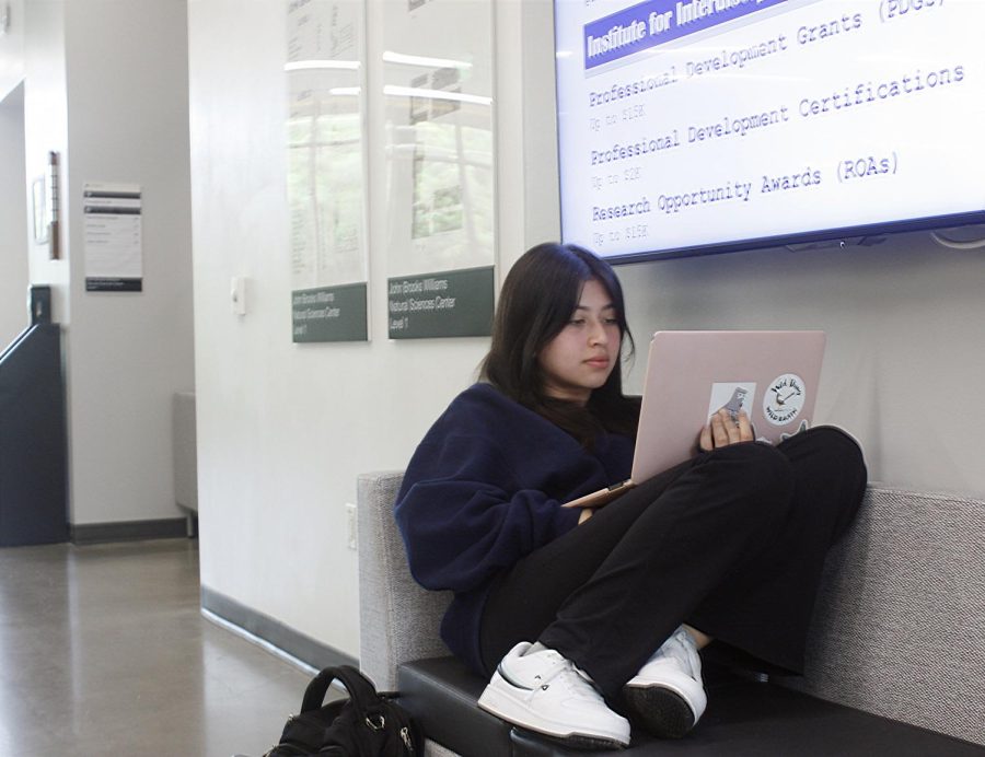 Freshman Michelle Rodriguez, a forensic science major, studies in the John Brooks Williams - South building, home to the School of Natural Sciences. The new School of Health Sciences will be one of three science schools at the liberal arts university. 