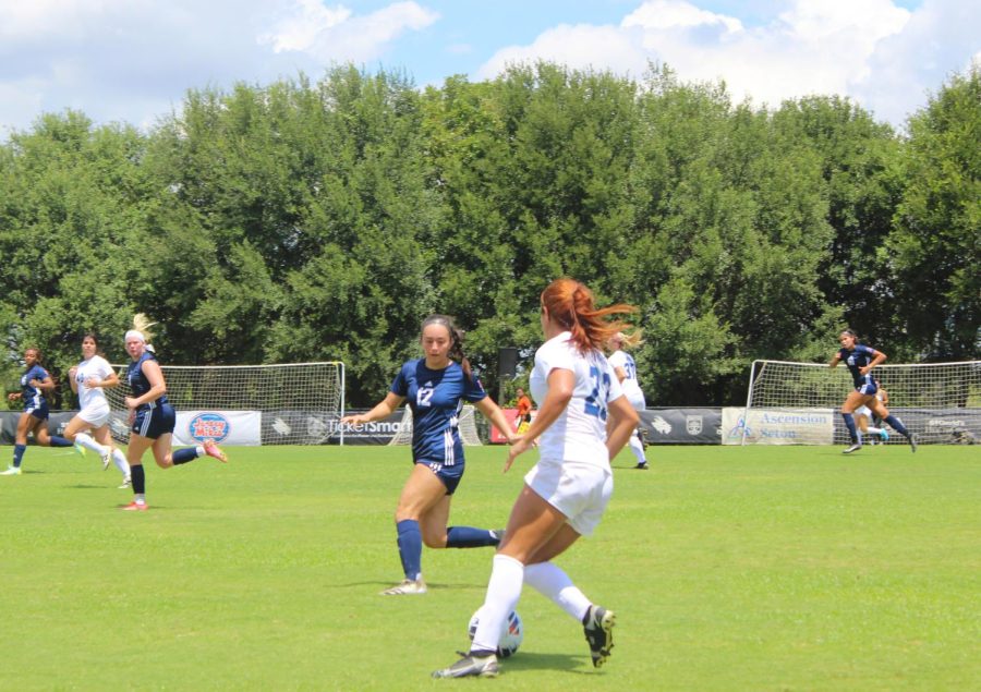 Hilltoppers, dressed in white, go against the Newman Jets in their first game of the season, taking home a massive win.