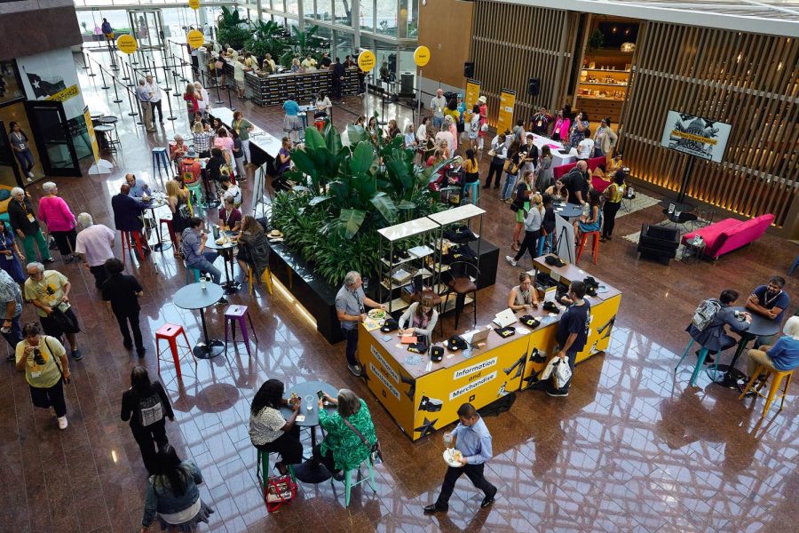 On Thursday, Sept. 22, people gathered inside the Omni hotel's atrium to collect their Tribfest 2022 merch and media access badges. 