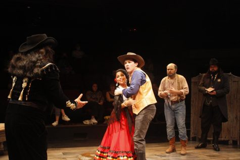 Valero performed by actor Che Greeno (pictured right) holds Marianne portrayed by costar Mariah Fonseca (pictured left) as the dramatic scene unfolds.