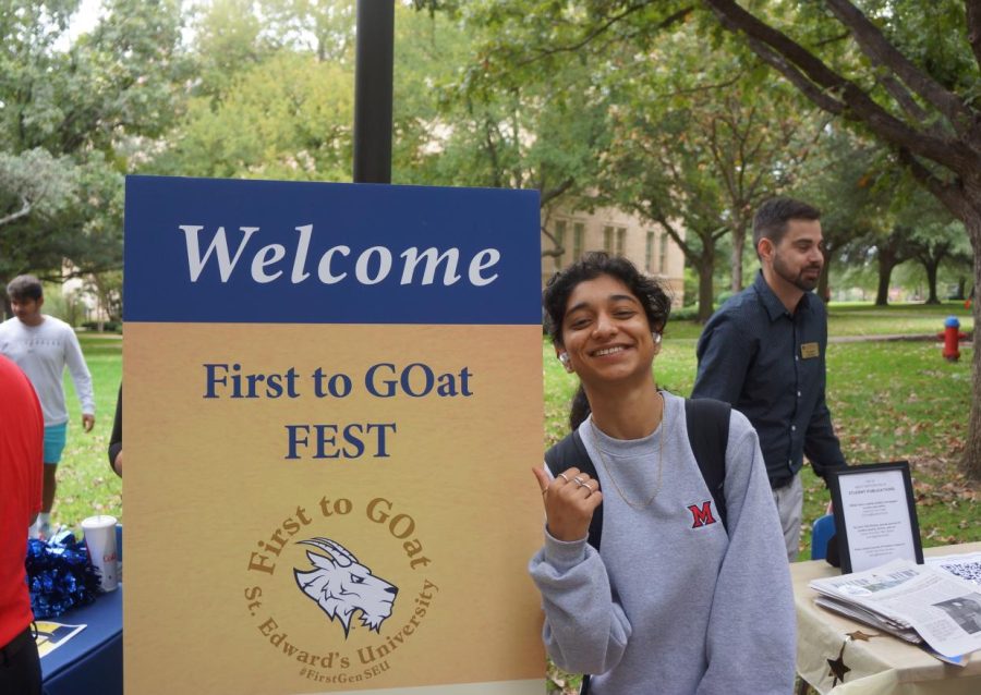 Raveena Devjee, sophomore, visits the writing booth at the First To Goat Fest.