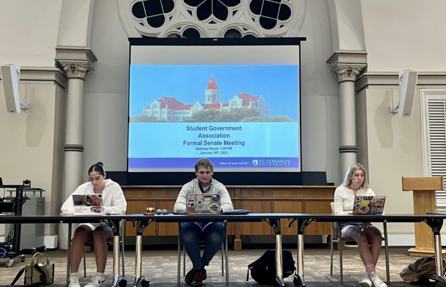 Student Government Association’s Secretary of Senate Nicole Williams (left), Vice President Matt Gerrets (center) and Parliamentarian Eveleigh Jennings (right) prepare for the senate meeting to begin.