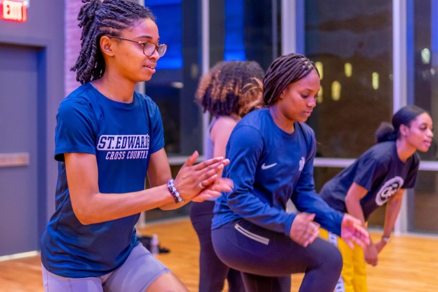 Students attending Step 101 stood next to their friends, attempting to learn the intricate details to step dance. 
