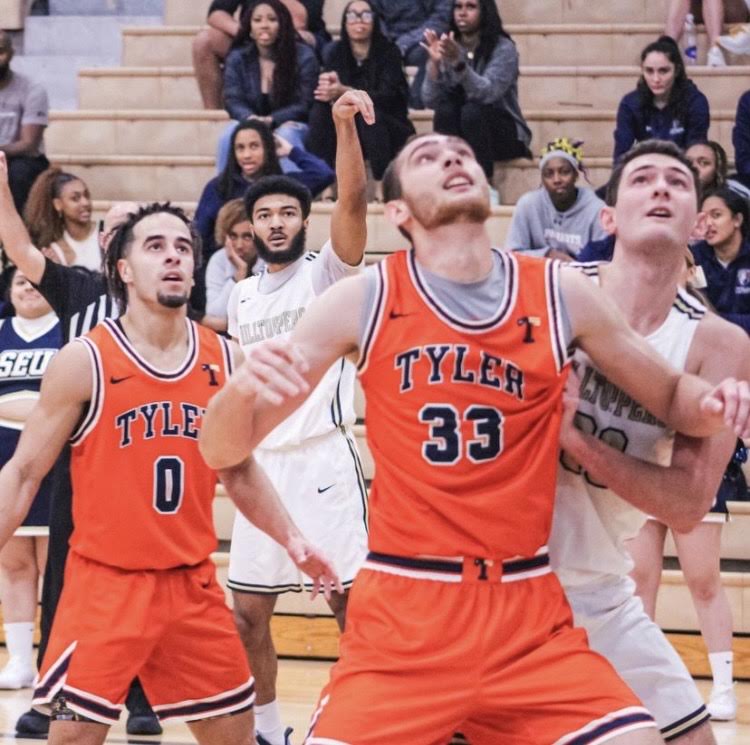 Sean Elkinton battles UT-Tyler for a rebound on February 4, at the Recreation and Athletic Center.