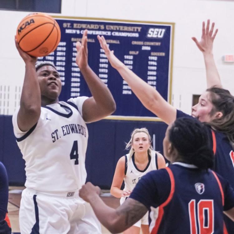 Morgan Gary (left) shoots a lay up against UT-Tyler at the Recreation and Athletic Center.