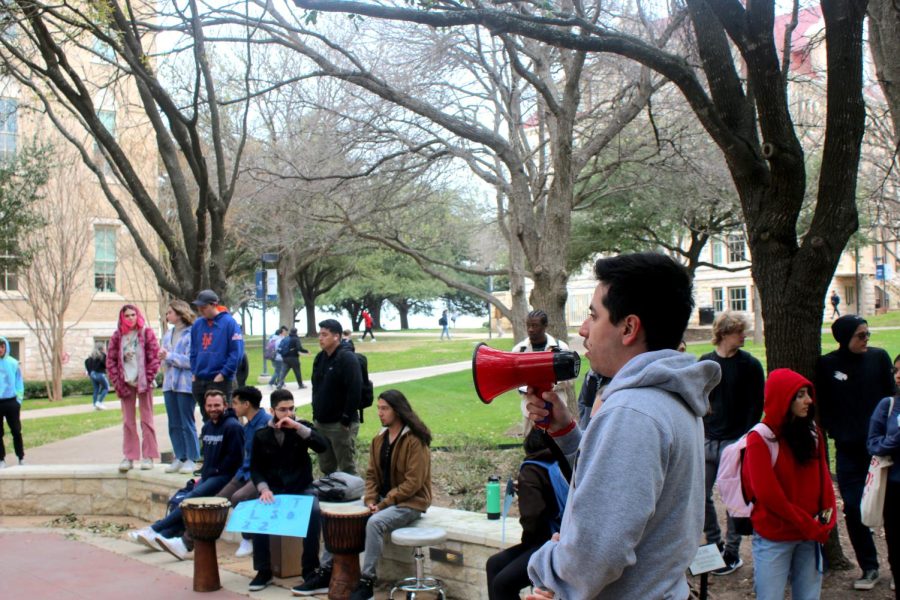 Ethan Tobias, an SGA member and Big Event director, addresses the crowd, urging students to share their concerns with SGA representatives.