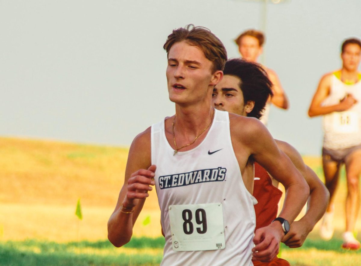 Freshman Hogan Heikkinen runs for St. Edward's University's cross country team on Sept. 1 at the Southwestern-Concordia Opener.