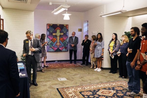 Students and staff join inside the new dedicated space for Holy Cross offices and affiliates within Premont Hall. Celebrating a new chapter within the Holy Cross Institute through art, treats and community