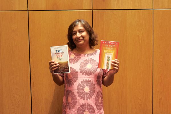 Sen poses with her two collections of work: The Pathless Sky and A New Race of Men from Heaven after giving a lecture as part of the universitys Visiting Writers Series.
