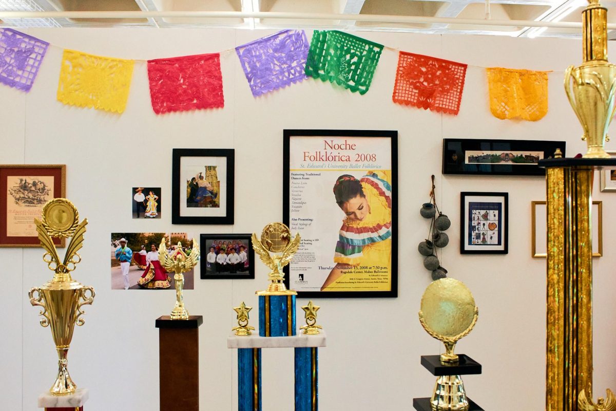 A unique collection of awards, outfits and past images gives visitors the ability to walk through St. Edward's Ballet Folklorico's history. The exhibit is currently on display in Munday Library on the second floor.