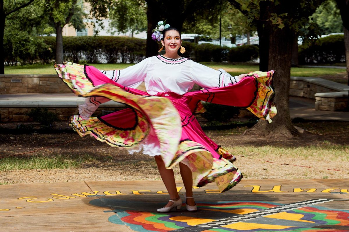 Neyna Singh spins while dancing Sinaloa, a traditional dance representing one of the 31 states of Mexico. 
