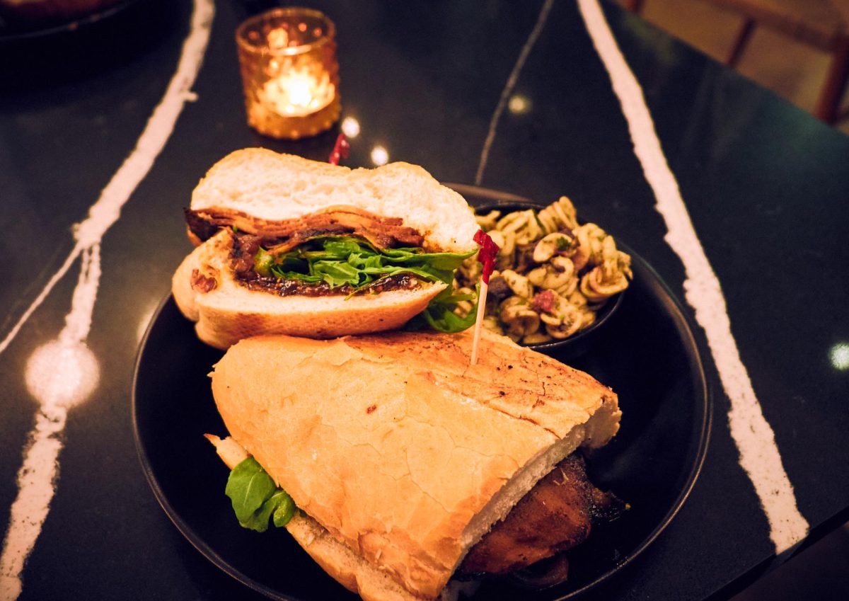 Bacon, Brie, Me sandwich with a side of pesto pasta salad.
