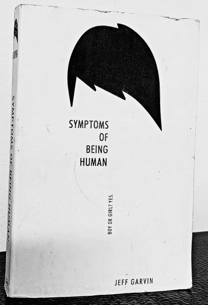 The cover of “Symptoms of Being Human” by Jeff Garvin.