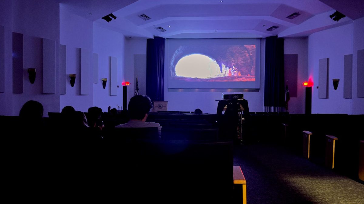 Students enjoying the film during the screening in Jones Auditorium.
