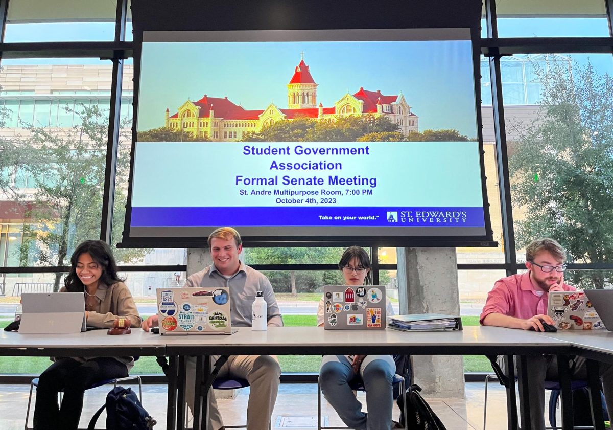 Members of Student Government Association, including Vice President Matthew Garrets, sit in the St. Andre Multipurpose Room for their weekly senate meeting. 