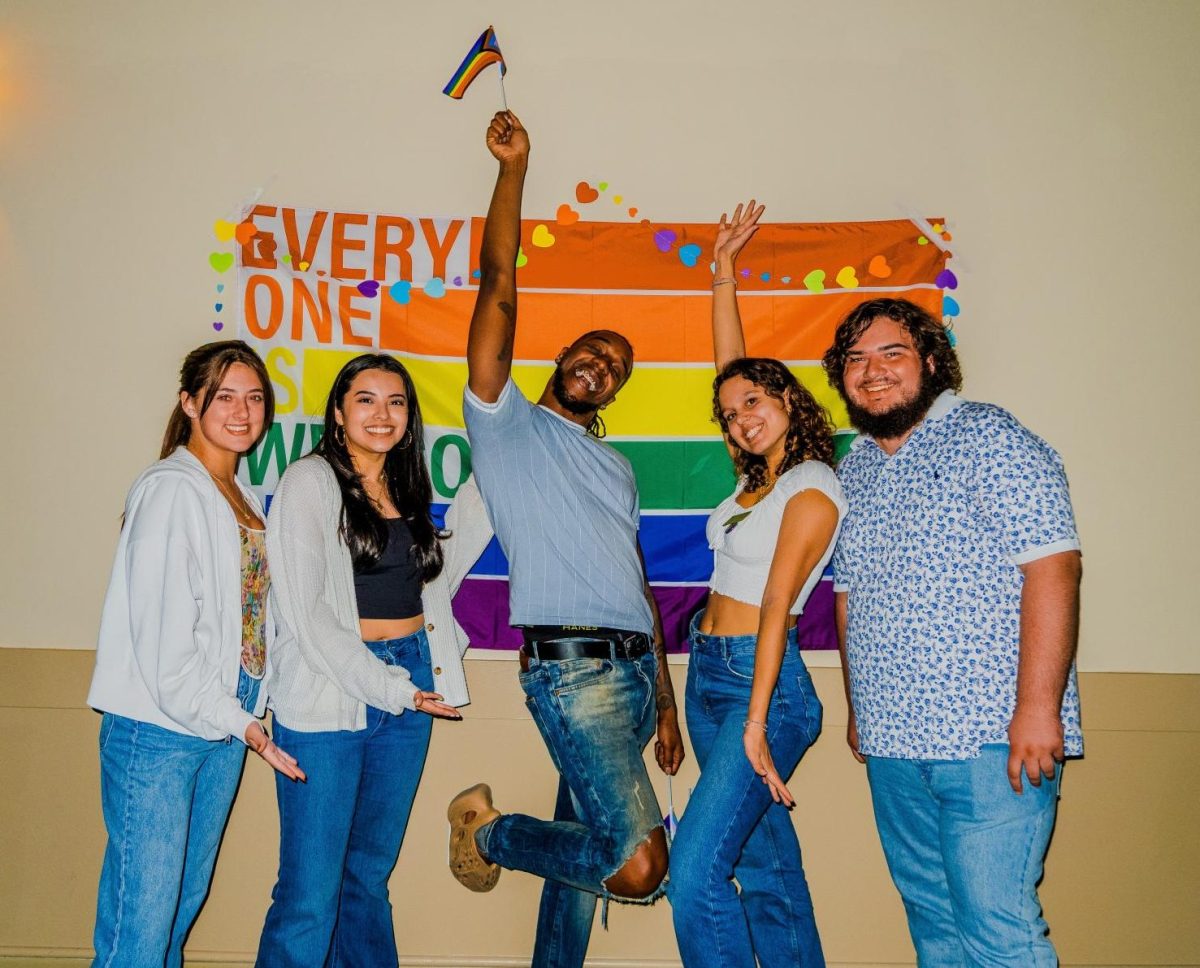 The University Programming Board team, celebrating and enjoying their event. “Since it’s Pride Week, we wanted to make this week just specifically for the LGBTQ+ students,” Tate (middle) said. “To just show that we support them and are here for them.”