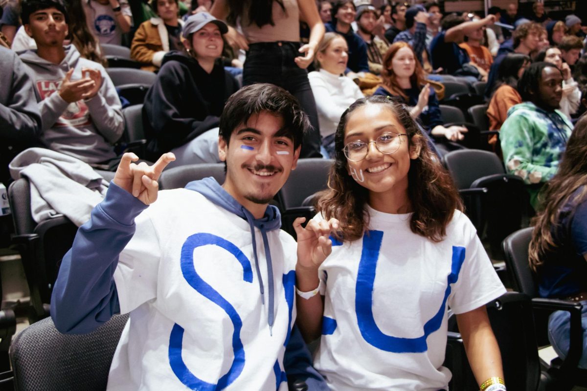 Current+Hilltoppers+flash+their+school+spirit+with+DIY+t-shirts+that+display+SEU+in+the+schools+colors.+Students+got+creative+with+shirts+and+face+paint.