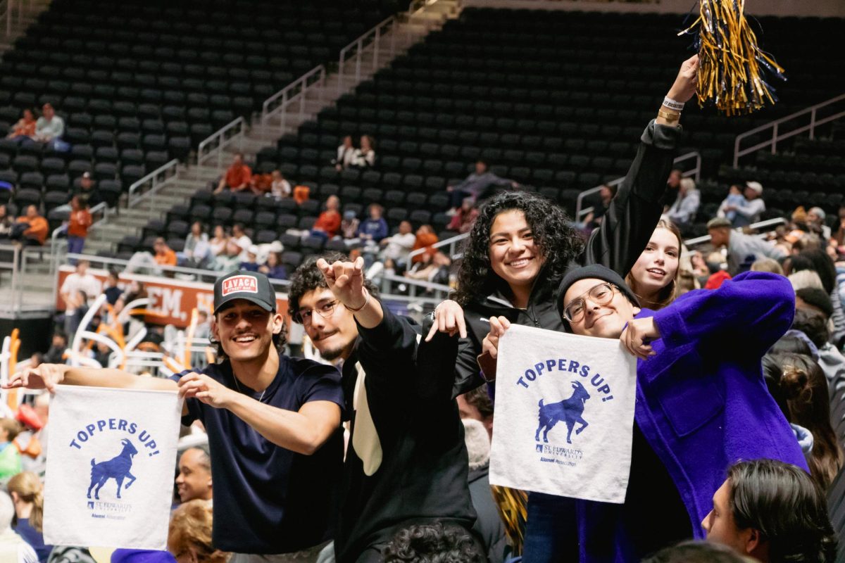 Students display rally towels and pompoms showing their school pride. The rally towels came in handy as the second half of the game had students sweating with SEU losing their seven point lead in the first four minutes.