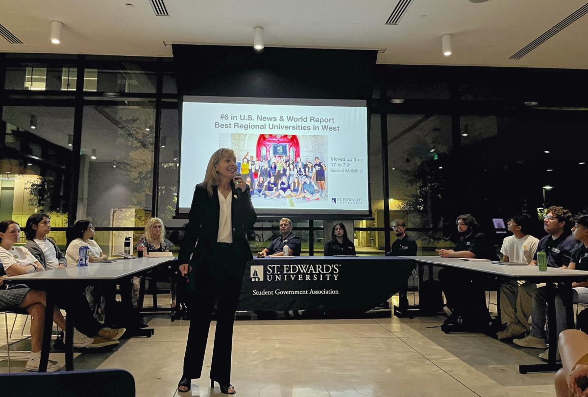 President Fuentes stands in front of the audience during this weeks Student Government Association senate meeting to give her State of the University Address.