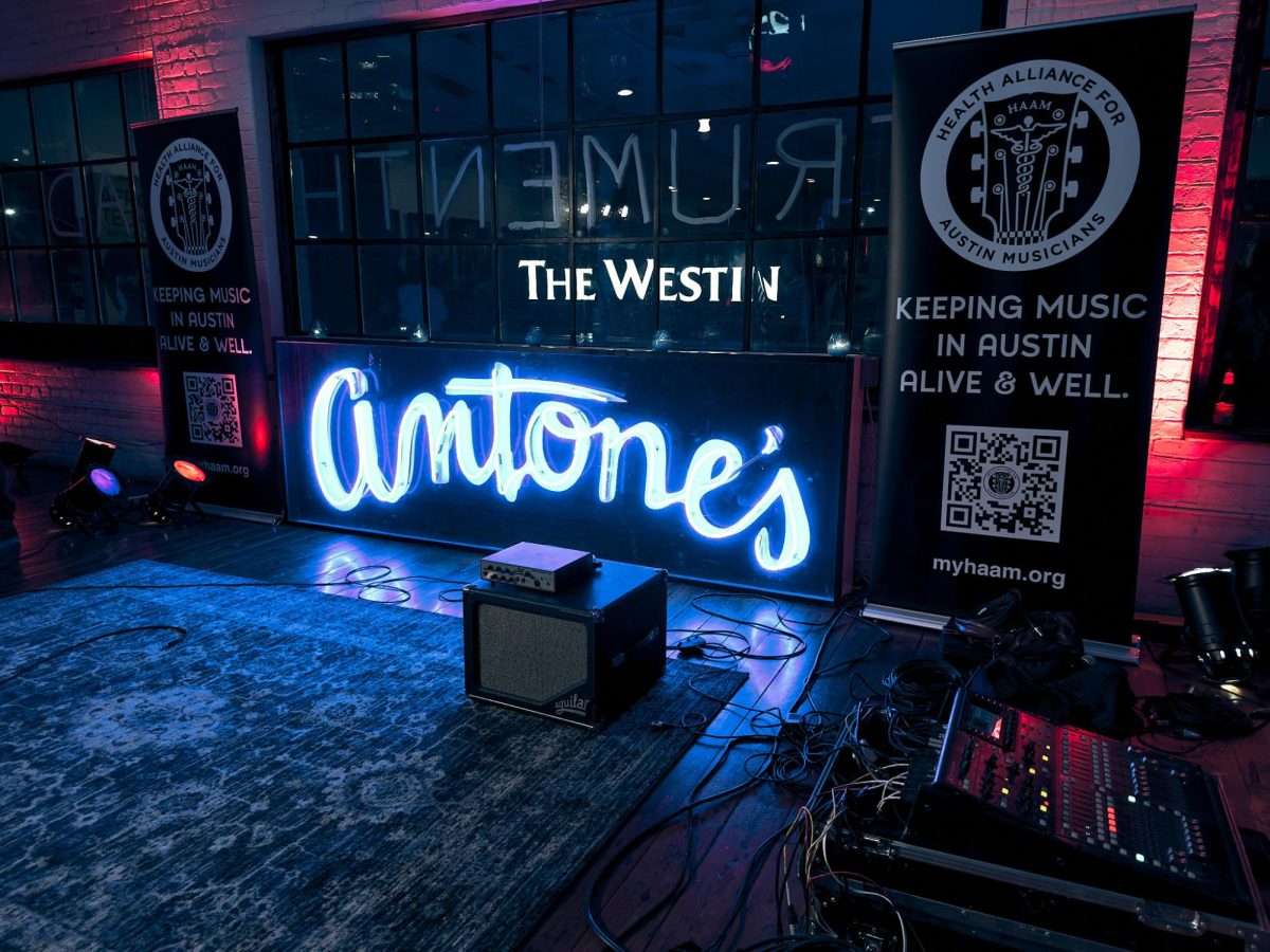 Despite moving locations since its start in 1975, Antone's continues to attract musicians and music lovers alike. This iconic piece of blues history here in Austin hosted Michael Weintrob's "Instrumenthead Invasion" gallery from Nov. 2 through Nov. 6. As part of the gallery's immersive experience, various musicians, including the Soul Supporters, Natalie Price, Gordie Johnson and Matt Hubbard, jammed on a make-shift stage throughout the exhibition. The stage itself had a simple setup: a couple amps, cords running around a patterned rug and a neon blue light spelling out "Antone's" in the background.