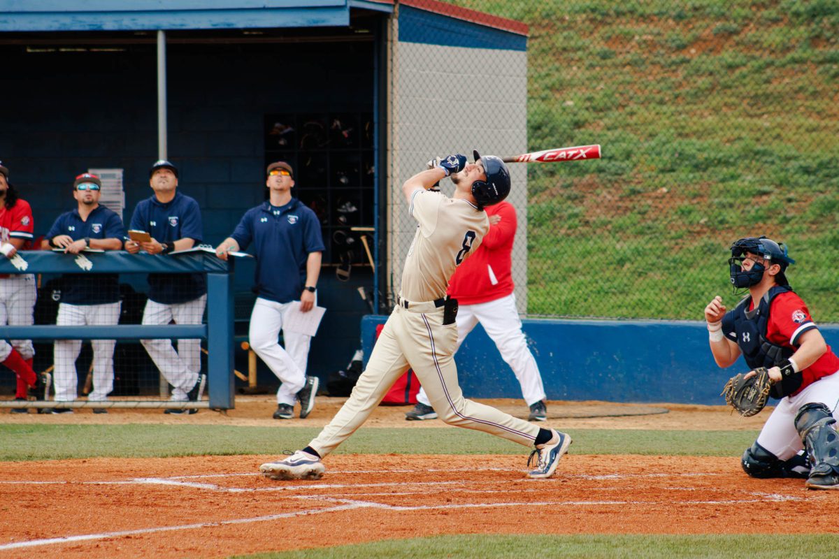 Senior Davis Drewek hits a grand slam in the bottom of the 7th inning to tie the game 10-10.