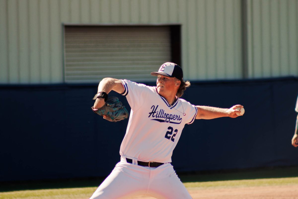 Senior Pitcher Colin Jackson at full extension, after stepping in for the injured Haeven Cichoki.