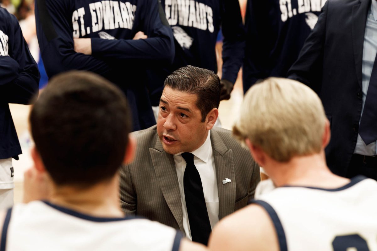 St. Edward’s Head Coach Andre Cook led his team in the huddle. Cook was named D2 Coach of the Week by HoopDirt.com.