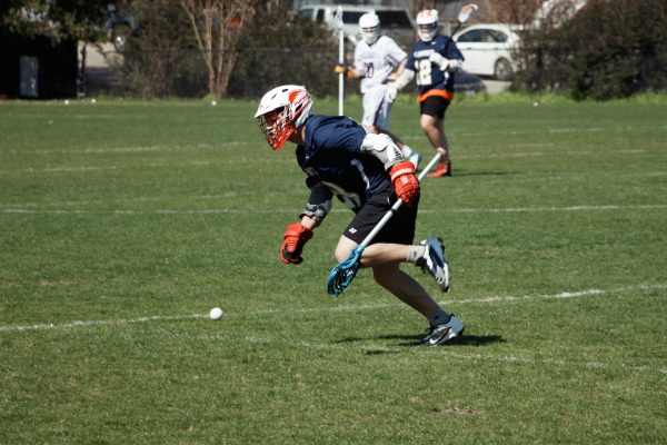 Freshman midfielder Kent Nishimura goes for the ball in an offensive effort for the Hilltoppers.  