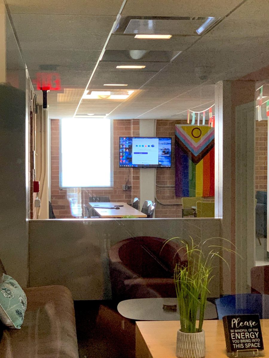 The Pride flag referenced in St. Edwards Universitys statement hanging on the wall of the Office of Equity and Employee Relations in Equity Hall room 131. 