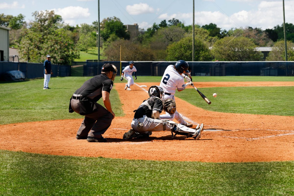 Senior+Kyler+Kerlin+went+up+to+bat+four+times+during+the+nine+inning+game.+Kerlin%E2%80%99s+two+hits+secured+three+runs+for+the+Hilltoppers%2C+giving+a+solid+advantage+for+the+8-3+win+over+the+University+of+Arkansas+-+Fort+Smith+Lions.+