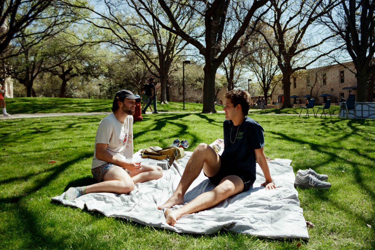 Hilltop Views Social Media Editor Bruno Fusaro and his friend Jacob Zivin sit by the lawn talking and working while enjoying the day. “The weather is so nice for a year now we have been coming and even bought the blacket to always come and have a lot of fun,” Fusaro said. Zivin talks to Fusaro about the weather and how they are enjoying their time on the lawn. “Good grass, there’s good sunlight, and good shade with it also being a very social area versus the lawn by Trustee,”Zivin said.