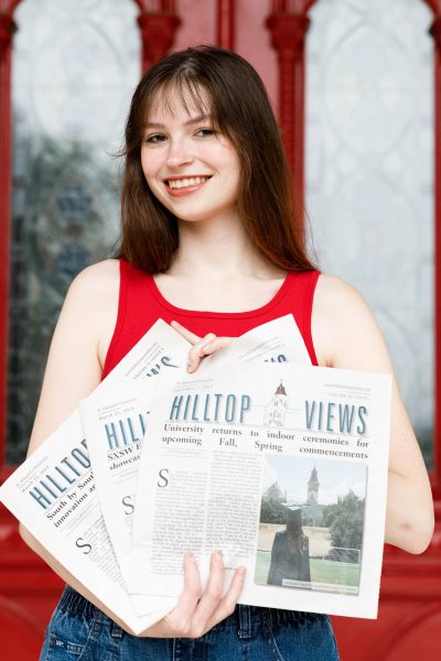 During her time at Hilltop Views, Chloe has written everything from Viewpoints to breaking news. Chloe poses with the three issues of the paper that feature her stories on the front page. 