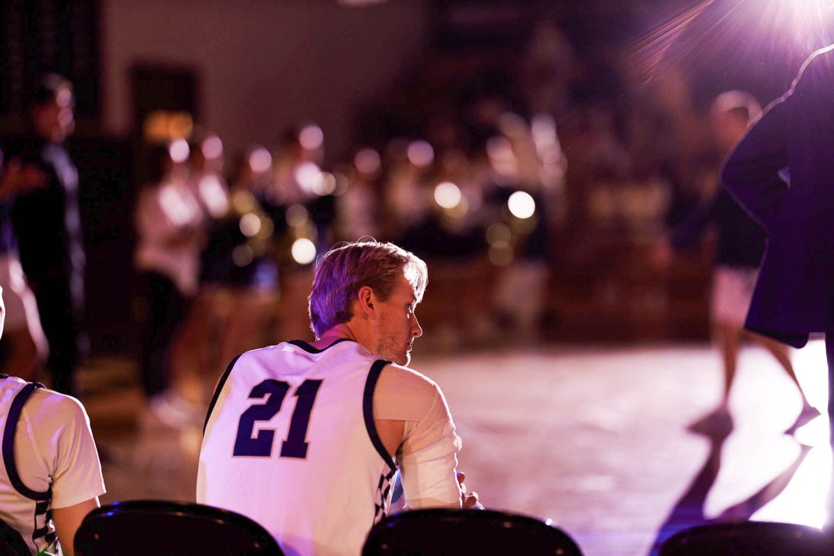 5th year student athletes reflect on closing this chapter of their lives, looking back at their accomplishments, the difficult decisions that were made, and the challenges they faced. Graduate student and 5th year basketball player Bennett Mohn sits on the bench, waiting for the announcer to call him and announce him as part of the lineup one last time, as he played his final game — facing St. Mary’s University, the Hilltoppers biggest rival.