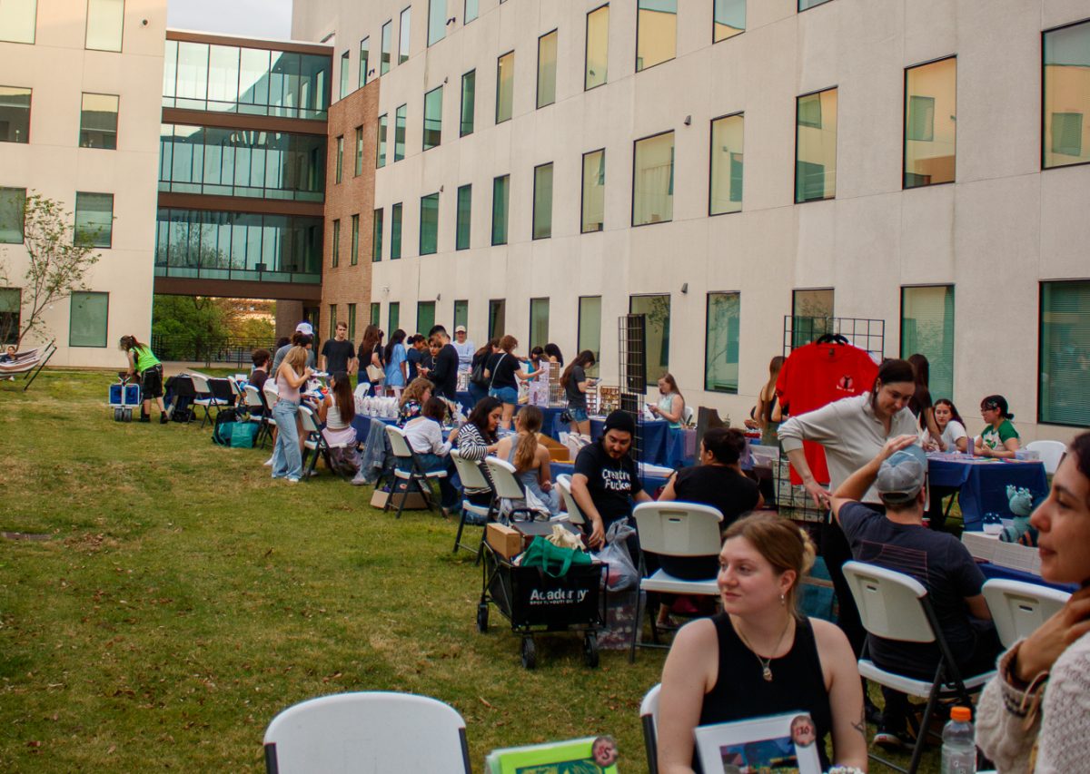 Students browsed handcrafted merchandise at the second annual St. Andre Market, where over 250 attendees gathered to support student entrepreneurs. The event, organized by the St. Andre residence life staff, has become the hall's most popular program.
